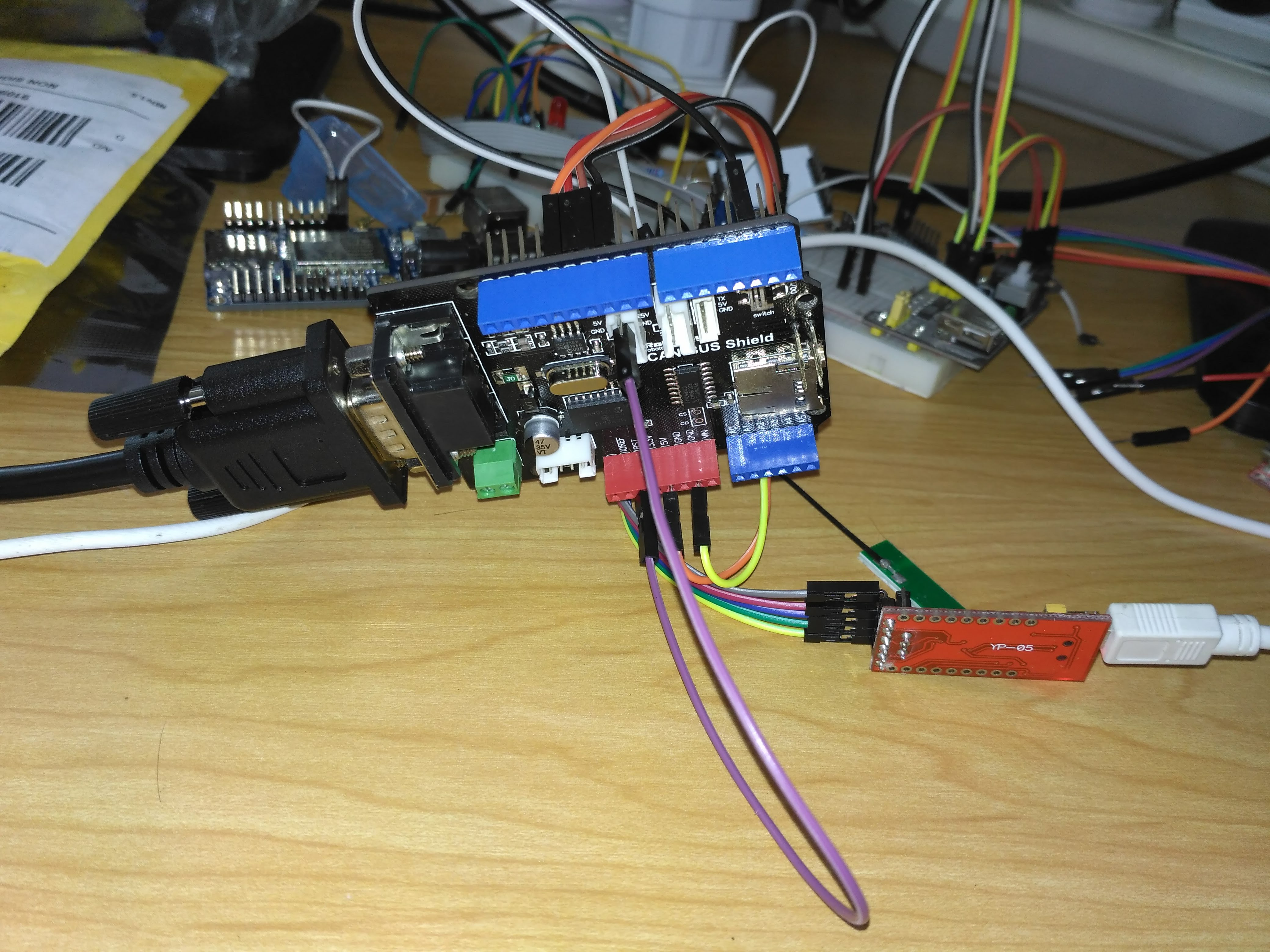 Early EV Black Box prototype — Arduino-based CAN Bus Shield with serial connector and USB adapter