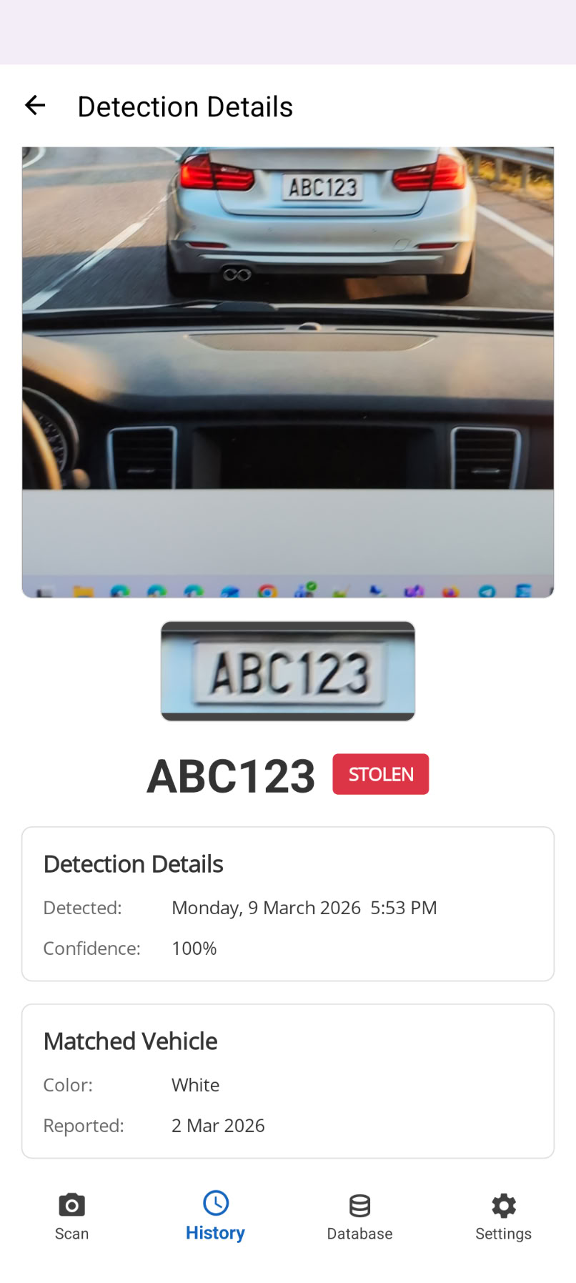 PlatePatrol detection details showing STOLEN badge, full frame photo, confidence score and vehicle info