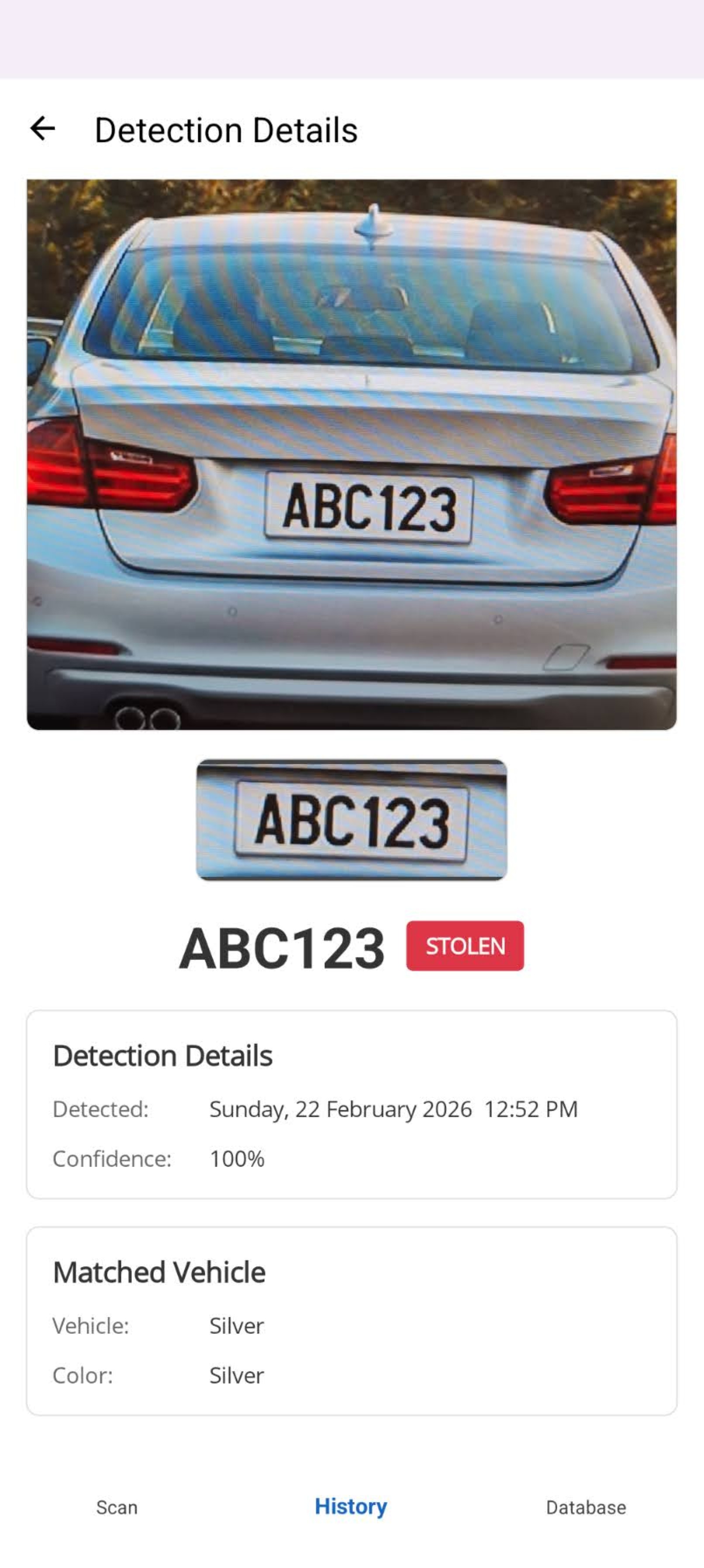 PlatePatrol detection details showing STOLEN badge, full frame photo, confidence score and vehicle info